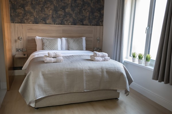 An image labelled Superking Double or Twin Room