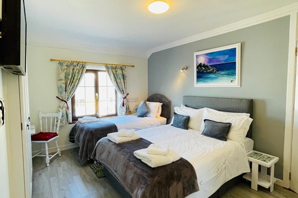 An image labelled Triple Room