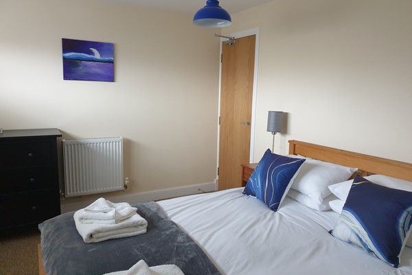 An image labelled Mews Apartment