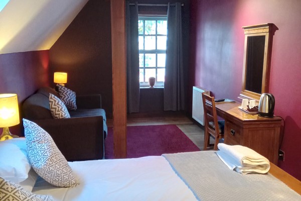 An image labelled Triple Room