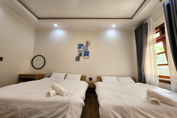 An image labelled Superior Twin Room