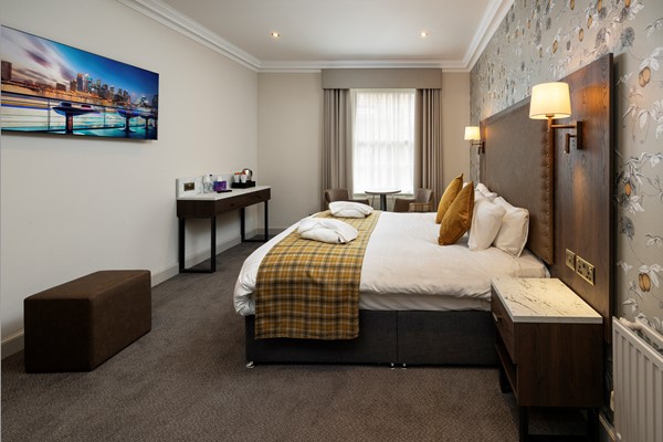 An image labelled Quad Room