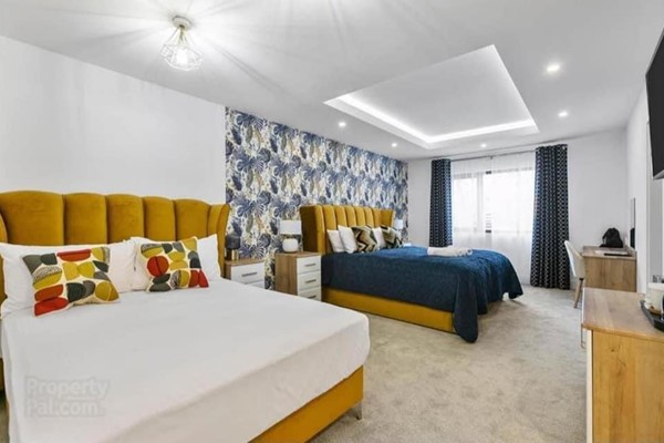 An image labelled Triple Room
