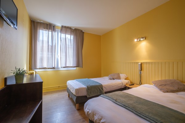 An image labelled Triple Room