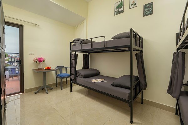 An image labelled 4 Bed Mixed Dorm