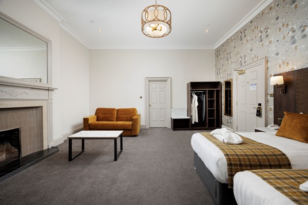 An image labelled Quad Room