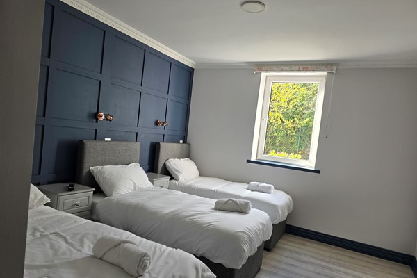 An image labelled Standard Triple Room