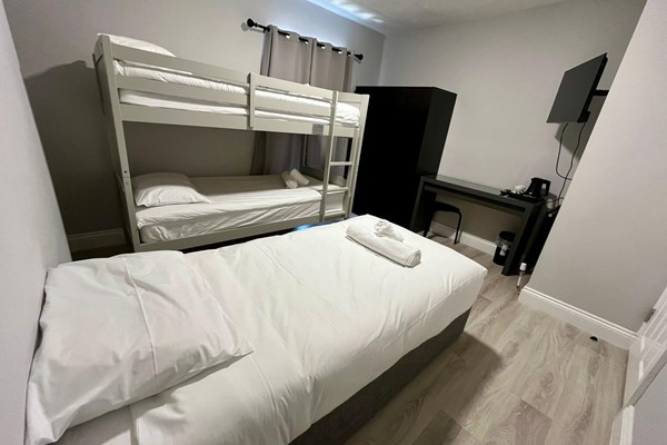 An image labelled Triple Room