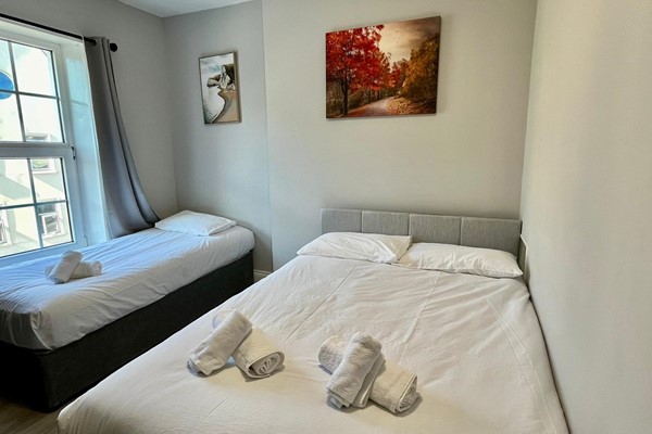 An image labelled Comfort Triple Room
