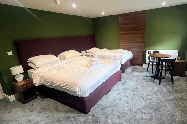 An image labelled Triple Room