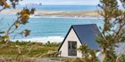 An image labelled Deluxe Pods along the Coast of Donegal