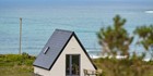 An image labelled FAILTE GO MACHAIRE RABHARTAIGH GLAMPING
