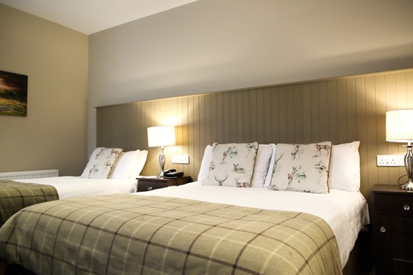 An image labelled Triple Room